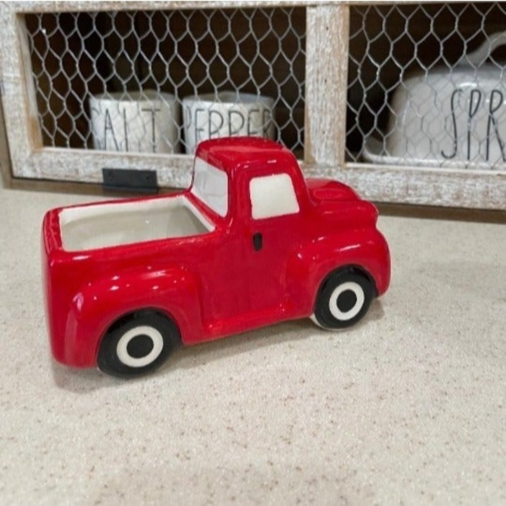Small red ceramic truck